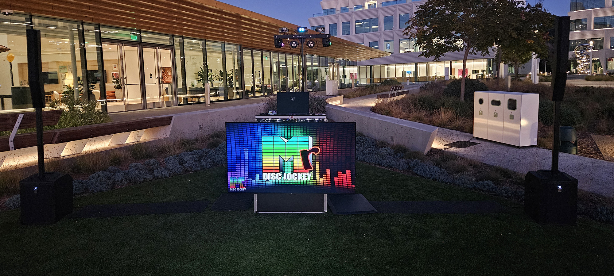 Mr Disc Jockey DJ Booth outside at night.